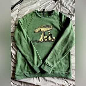 The brand is easy wear, size is medium, and the color is forest green.